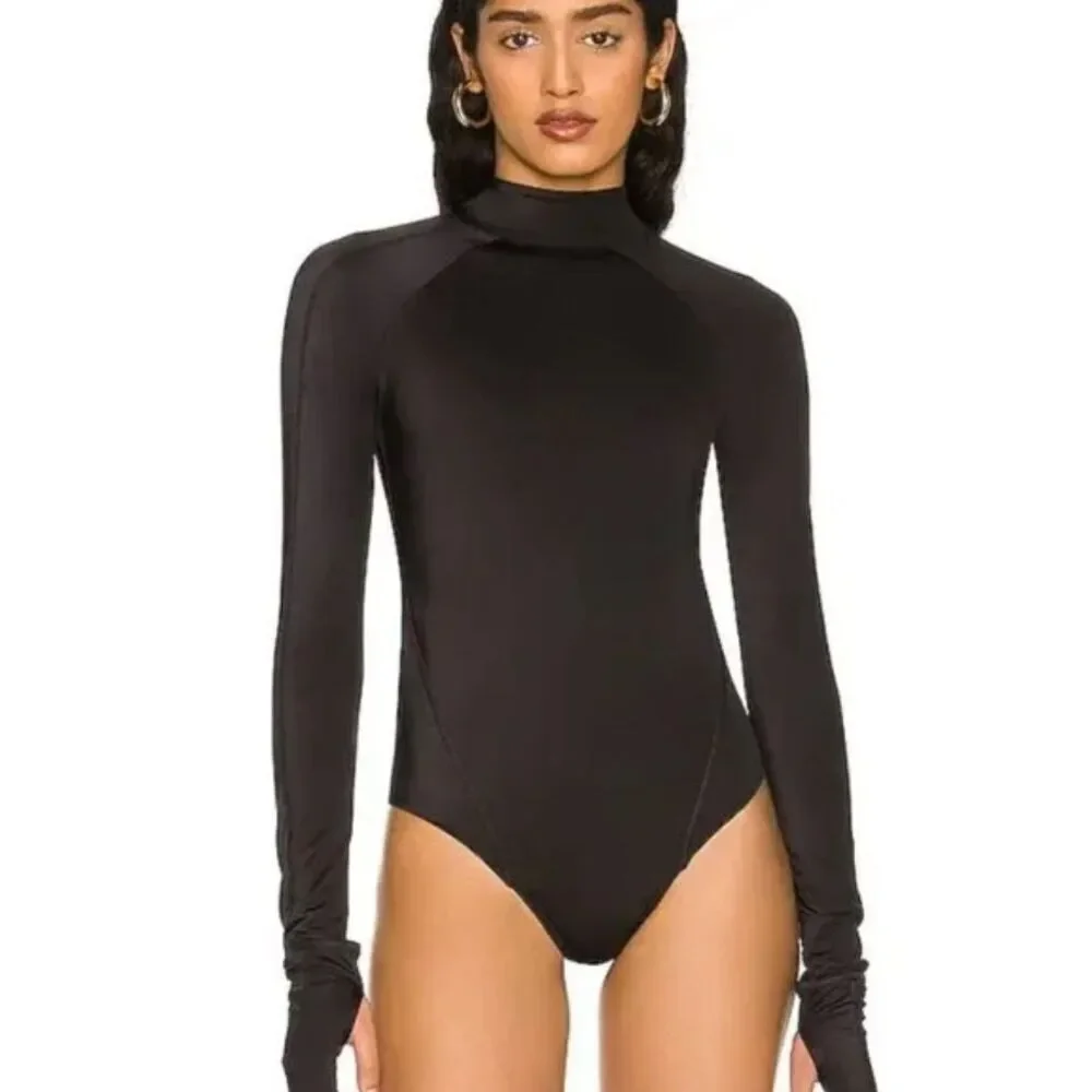 New. We Are HAH black 1-piece swim/bodysuit. Retails $240. Medium